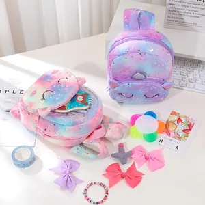 Unicorn plush mini backpack for girls with tie-dye purple fur and silver stars