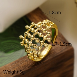 Macro shot of gold hollow grid ring showing 1.8cm width and 6g weight details