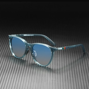 Detailed macro view of polarized sunglasses with teal frames and signature red-green stripes