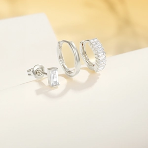 Detailed macro view of S925 sterling silver earring set with rectangle zirconia stones