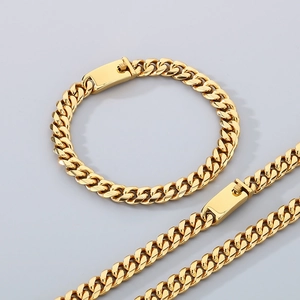 Detailed close-up of golden 8mm Cuban link bracelet and necklace set with sturdy buckles