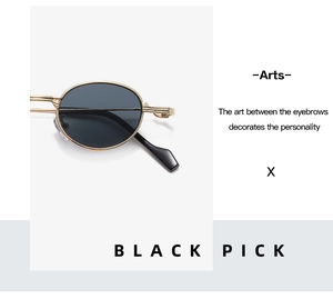 Detailed close-up of retro round sunglasses featuring a gold metal frame and black lenses