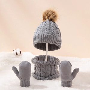Three-piece dark grey kids knit set with cable pattern, beanie with pompom and mittens