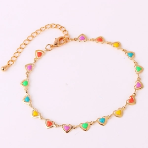 Detail view of gold heart link anklet with colorful enamel and adjustable lobster clasp