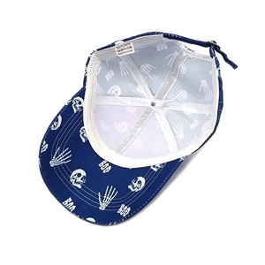 Dark blue baseball cap with white skull hand and BOO prints, shown from interior view