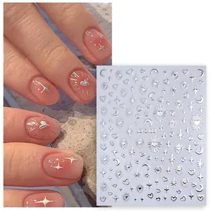 Self-adhesive silver star and moon nail art stickers with metallic finish effects