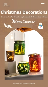 Macro shot of glass Christmas candle holders with reindeer and snowflake patterns