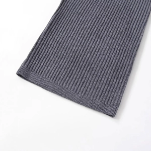 Close-up of dark grey rib knit fabric texture on a fashionable casual top for women