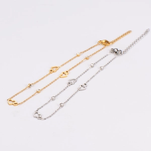 Minimalist stainless steel heart anklet with sparkling diamonds in gold and silver finish