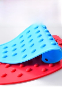 Close-up of heat-resistant silicone iron rest pad with solid anti-slip raised bumps