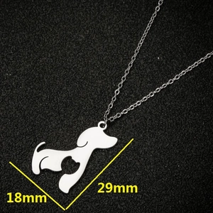Silver dog pendant necklace with heart cutout, dimensions 18mm by 29mm, stylish jewelry
