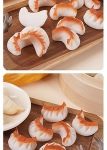 Macro shot of realistic PVC fried dumpling model with bamboo steamer on wooden tray