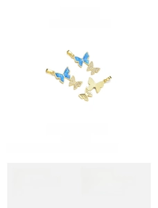 Detailed spec view of 18K gold plated butterfly pendant with blue opal and zircon