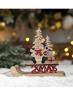Detailed view of a wooden Christmas sleigh with reindeer and warm holiday lighting