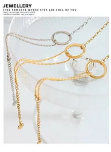 Detail of minimalist circular pendant with dual texture chain and adjustable tail