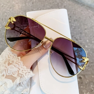 Classic aviator sunglasses with gold frames, purple gradient lenses and leopard decor