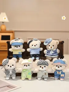 Detailed set of cute plush bear keychains wearing various stylish outfits on wood display