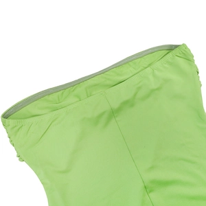 Detail of the non-slip silicone strip and ruching on a lime green halter dress