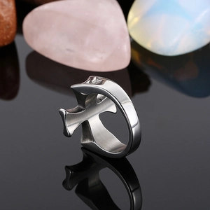 Retro stainless steel cross ring with black enamel drip on a black mirror surface