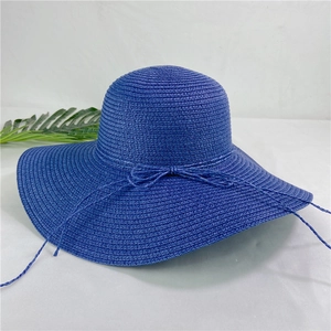 Navy blue wide brim straw sun hat with decorative ribbon bow for beach vacations