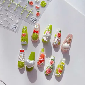 5D embossed nail art stickers featuring 3D strawberry and rabbit motifs in green and pink
