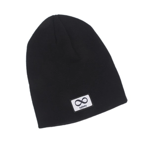 Detailed close-up of the black knitted beanie featuring an Infinity symbol patch