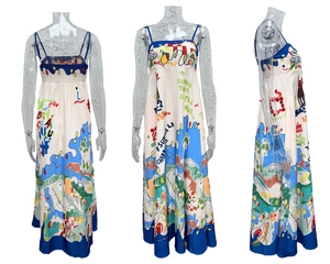 Detail of bohemian spaghetti strap dress with smocked bodice and vibrant graffiti print