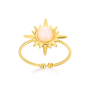 Detail of gold sun-shaped ring with twisted band and pink round stone inlay