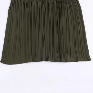 Deep green pleated midi dress featuring fine craftsmanship and light chiffon fabric details