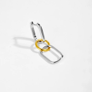 Close-up of S925 sterling silver earrings with gold and silver geometric links