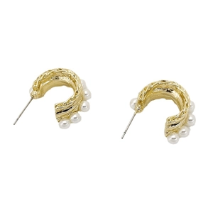 Chic gold-plated C-shaped hoop earrings with textured metal and white pearl accents