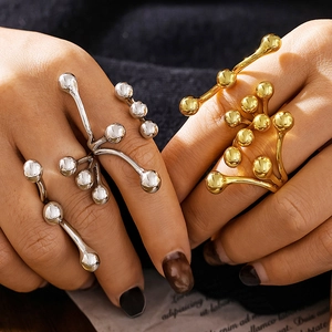 Abstract branch design gold and silver stainless steel rings with spherical bead details