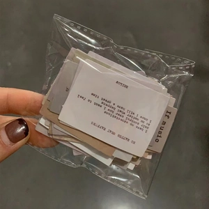 Close-up of 60 vintage motivational stickers in a transparent package for DIY projects