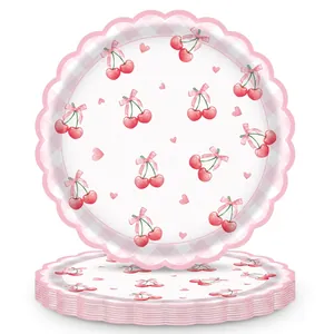 Detail of round scalloped paper plates with pink plaid cherry and bow watercolor design