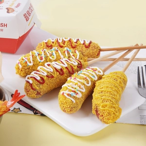 Realistic artificial crispy cheese hot dog models with mustard and ketchup on a ceramic plate