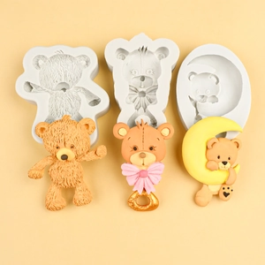 Three-piece set of teddy bear silicone molds with finished 3D cake toppers and chocolate bears