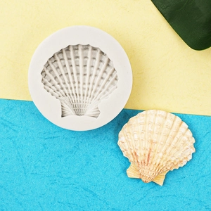 White silicone shell mold for ocean themed cake decor and handmade soap crafts