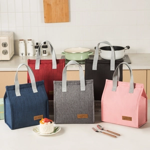 Vertical insulated lunch bags in five colors with portable handles and logo patch