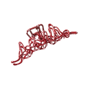 Irregular liquid metal hair claw in glossy red with white spots and hollow design