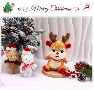 Cute brown plush reindeer with red collar and bell in a festive Christmas scene