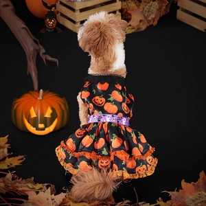 Detailed back view of Halloween dog dress with pumpkin prints and purple ghost belt