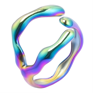 Macro view of fluid-shaped open ring featuring vibrant iridescent metallic gradients