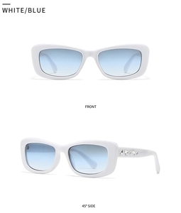 Detail view of small square white sunglasses with rhinestone temples and blue gradient lenses
