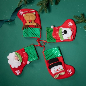 Set of four Christmas stockings with Santa, Snowman, Reindeer, and Bear sequin plush dolls
