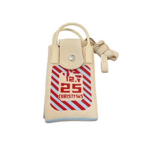 Mini Christmas knitted phone bag with festive stripes and calendar pattern strap