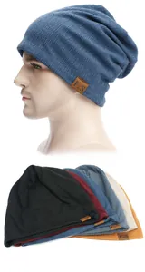 Detail view of ribbed knit beanies showing five colors and F&S leather patch