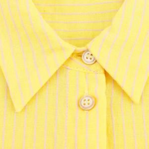 Chemise jaune rayée à manches longues pour femme avec col à revers et détails texturés