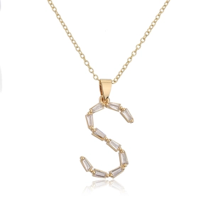 Detail of 18K gold-plated initial S pendant set with rectangular baguette-cut zircons