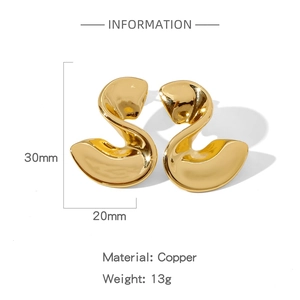 Detail view of gold swan-shaped stud earrings showing 30mm height and copper material specs