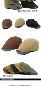 Detail of wool tweed newsboy cap showing the leather brim and adjustable inner strap
